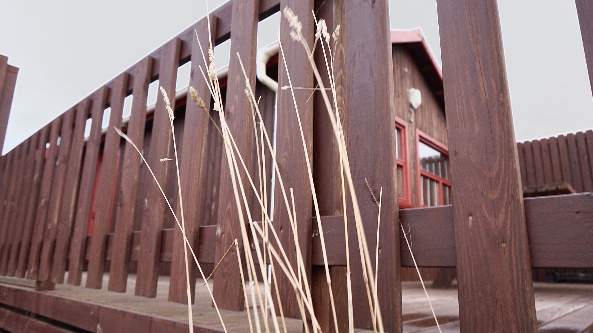 wooden fencing around a log cabin