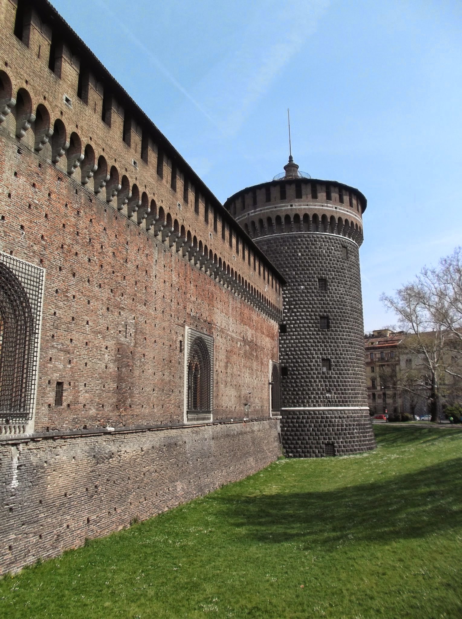 big red brick castle, blue sky